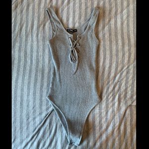 Lace up front rib knit bodysuit